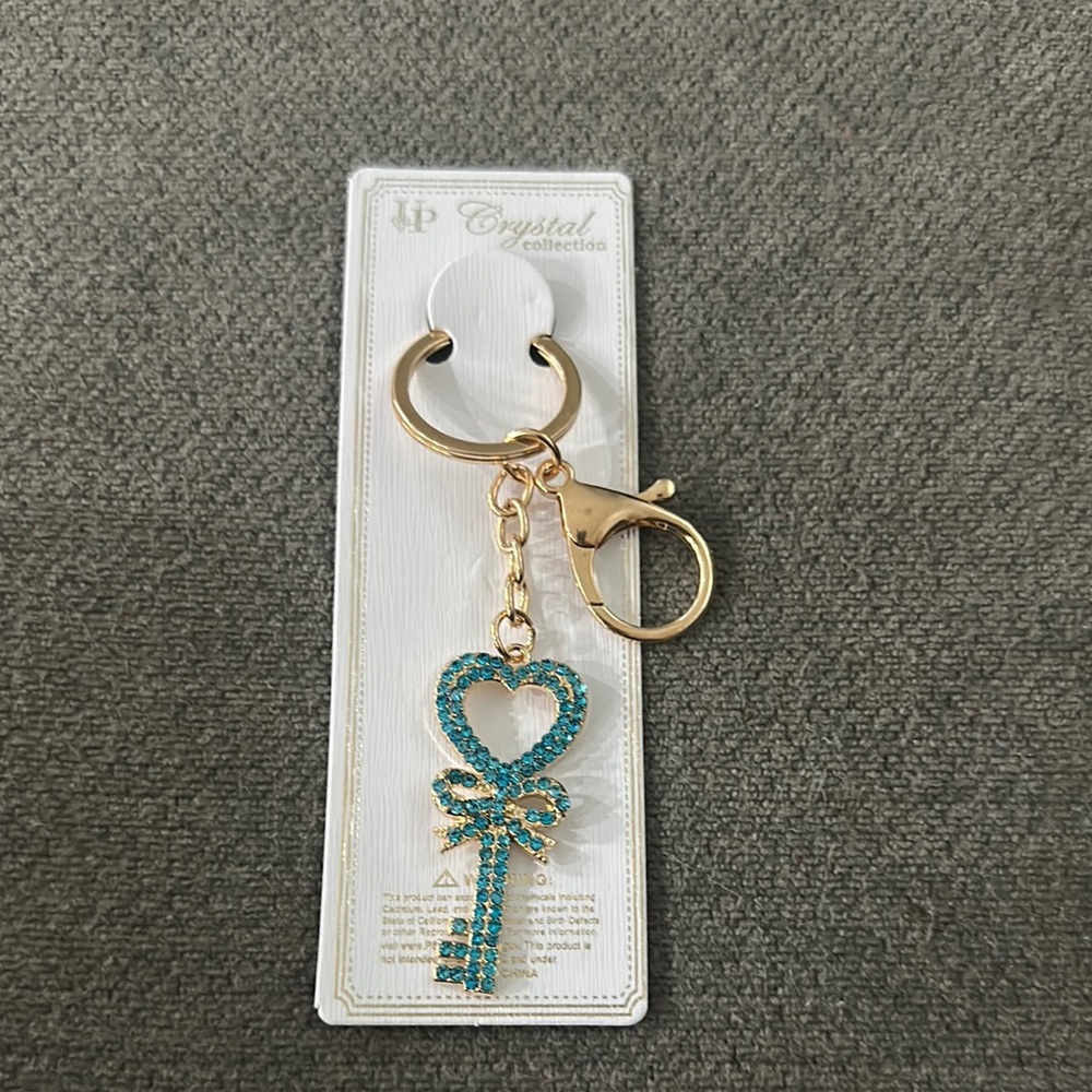 Gold and Blue rhinestone Keychain and purse, charm brand new stealing bag